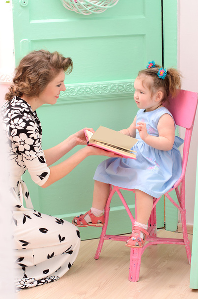 mommy and daughter reading book - Photo, Image