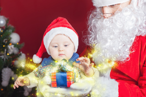 Happy baby and Santa Claus with gift, present box - Fotoğraf, Görsel