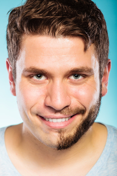 Handsome man with half shaved face - Fotoğraf, Görsel