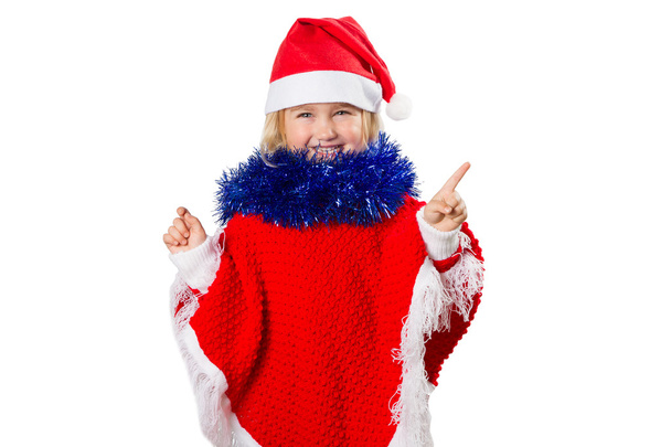  little girl in a hat Santa Claus on white background. - Фото, изображение