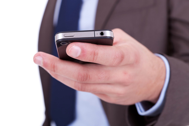 Teléfono celular plano en mano de hombre de negocios
 - Foto, Imagen