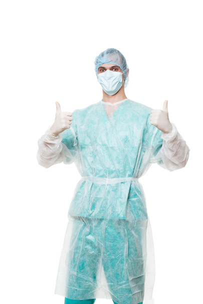 Surgeon portrait. isolated on white background. He raised thumbs. satisfied - Foto, Imagem