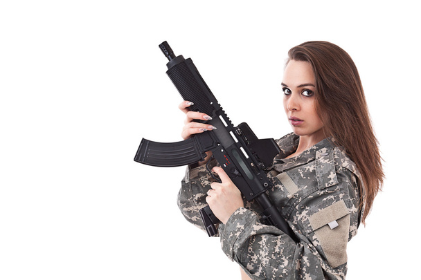 Young woman soldiers with gun - Foto, Imagen