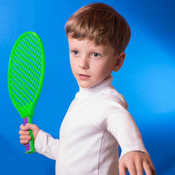 the boy played tennis - Фото, зображення