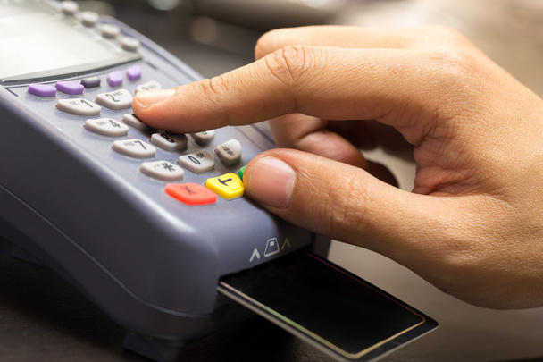 Close Up Of Hand With Credit Card Swipe Through Terminal For Sal - Φωτογραφία, εικόνα