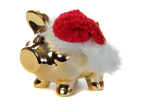 Piggybank dourado com tampa de saco de geléia
 - Foto, Imagem