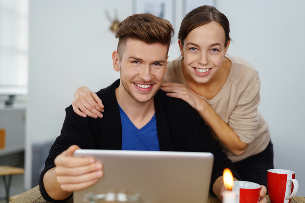 loving man and woman with laptop - Φωτογραφία, εικόνα