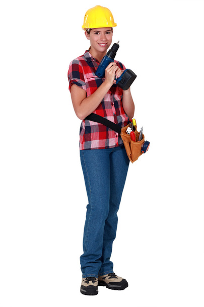 Female worker with a drill - Φωτογραφία, εικόνα