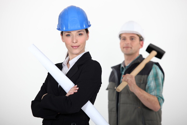 Businesswoman and craftsman posing together - Photo, Image