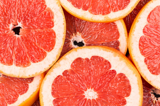 Grapefruit slices close up - Foto, immagini