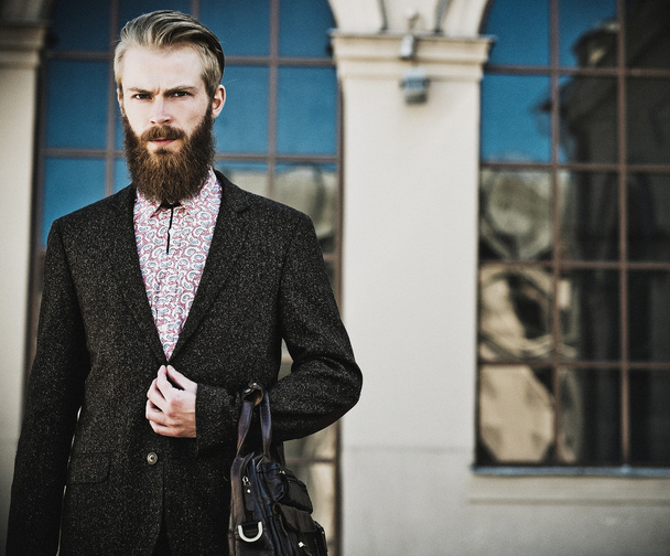 Portrait of young beautiful fashionable man - 写真・画像