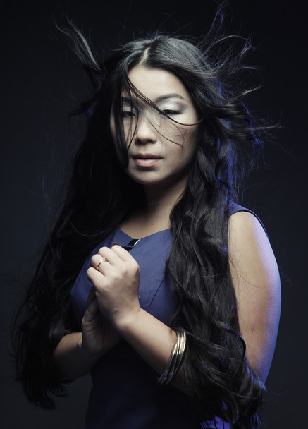 asian fashion woman with wind in the hair - Fotografie, Obrázek
