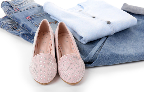 Blue jeans and jacket with shiny pink shoes isolated on white background - Photo, Image