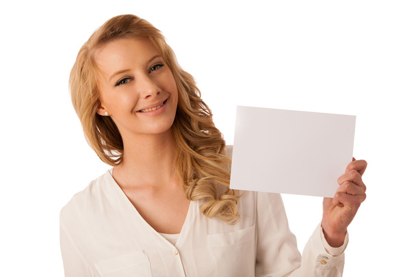 Beautiful young caucasian business woman holding a blank white b - 写真・画像