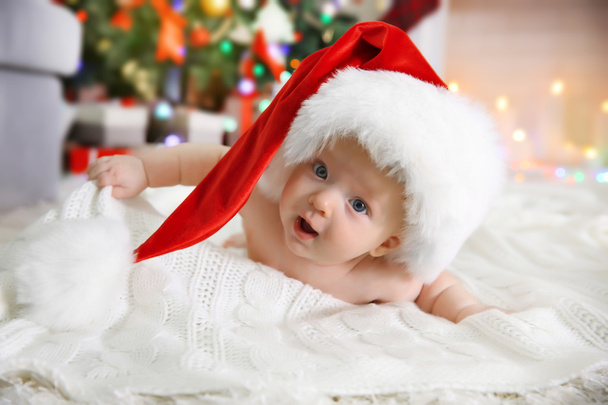 Naked baby in red hat at Christmas - Zdjęcie, obraz