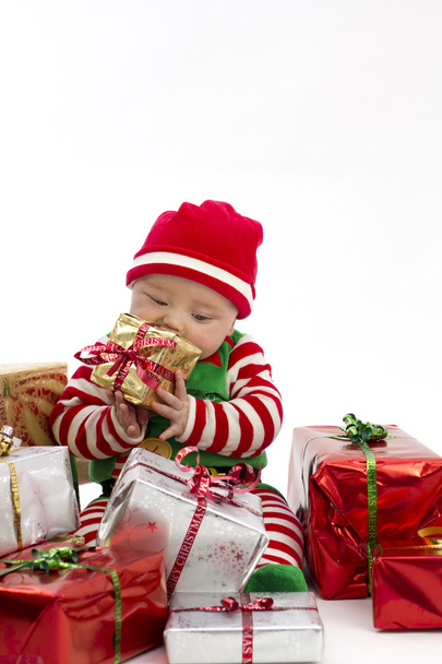 Babys első karácsonyi eszik jelen - Fotó, kép