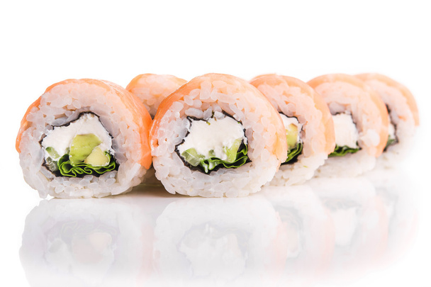 sushi with philadelphia cheese, avocado and salmon - Фото, зображення