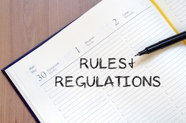 Règles et règlements écrivent sur le carnet
 - Photo, image