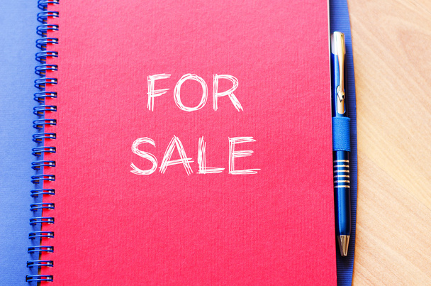 For sale write on notebook - Photo, Image