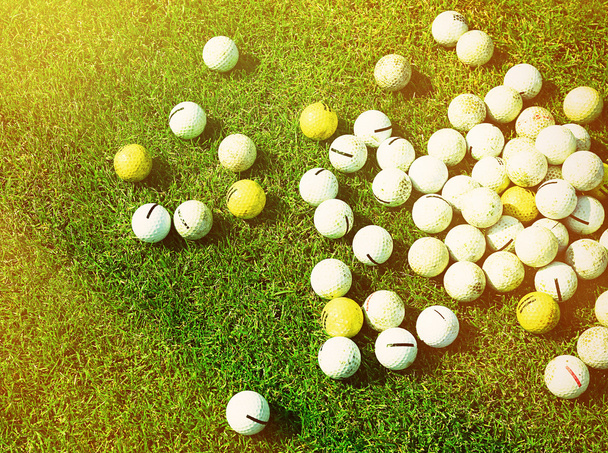 Golf balls on grass   - Фото, зображення