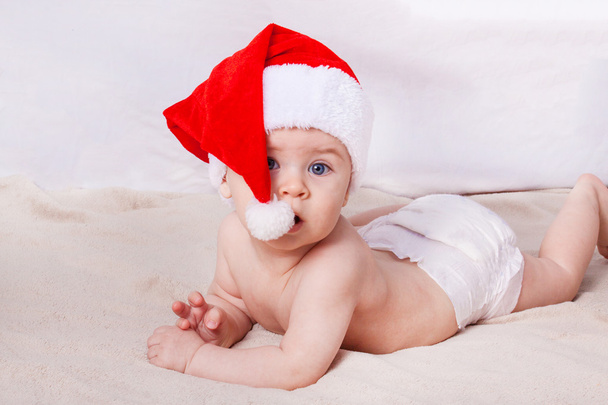 Bebé pequeno bonito celebra o Natal
.  - Foto, Imagem