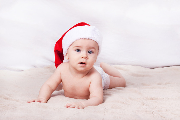 Beautiful little baby celebrates Christmas.  - Foto, afbeelding