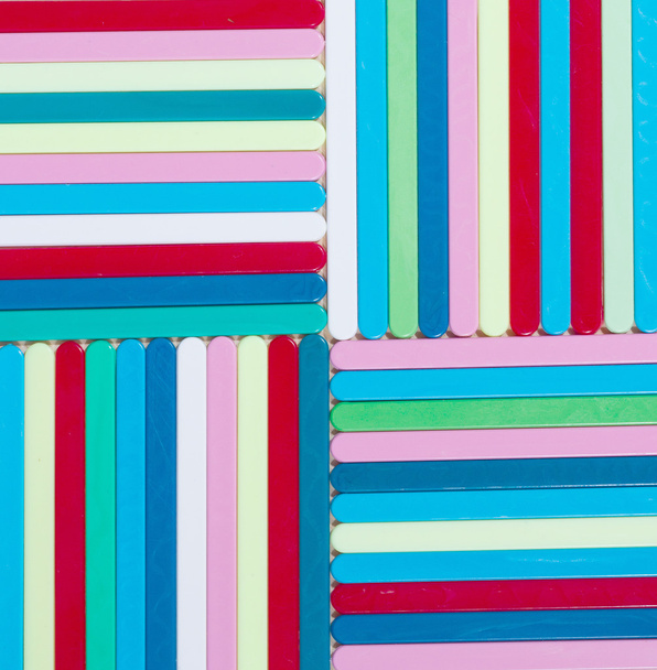 Colorful striped background. Plastique sticks of different color - Photo, Image