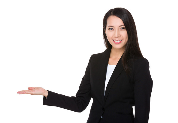 Молода азіатська бізнес-леді в діловому костюмі
 - Фото, зображення