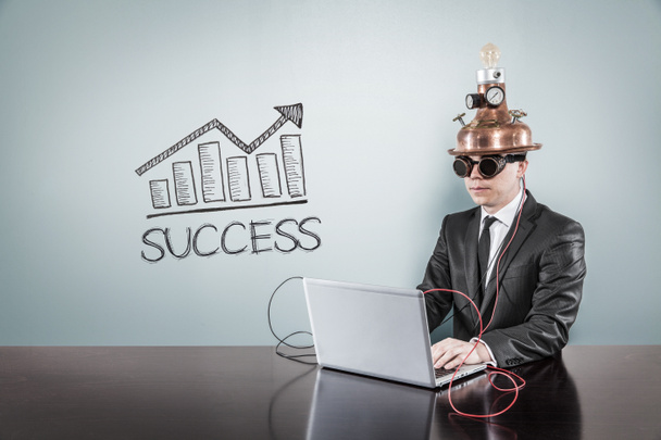 Success concept with vintage businessman and laptop - Foto, afbeelding