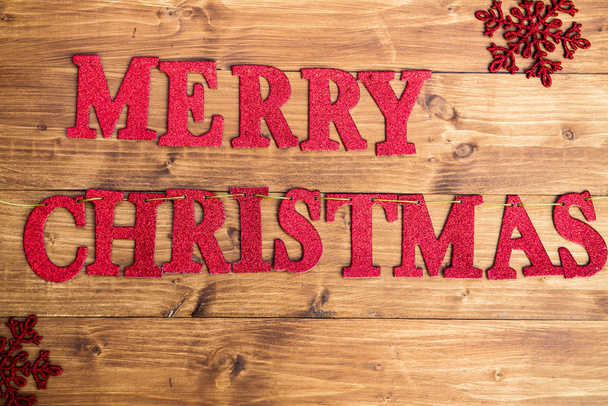 Sanat Hyvää joulua valmistettu Red Glittering Letters Sijoitettu
 - Valokuva, kuva