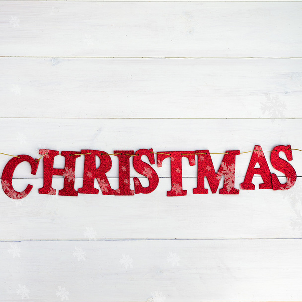Word Christmas made from Red Glittering Letters Placed on the St - Photo, Image