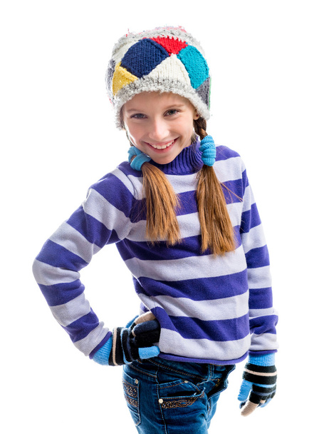 Cute little girl in a warm sweater and  cap - Фото, изображение