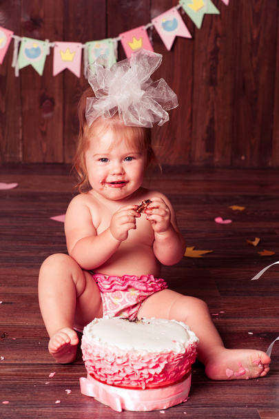 Baby girl celebrating first birthday - Fotografie, Obrázek