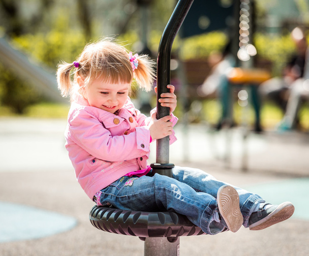 Cute little girl on  playground - Foto, immagini