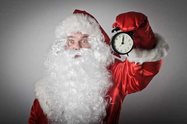 Santa Claus and a clock - Φωτογραφία, εικόνα