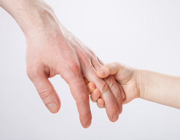 Child holding father's hand - Zdjęcie, obraz