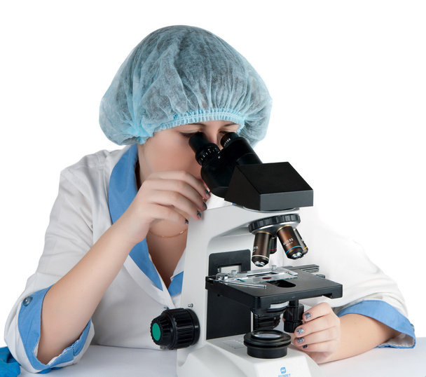 Estudiante femenina usando un microscopio
 - Foto, Imagen