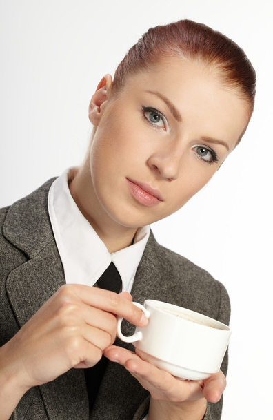 Businesswoman with cup of coffee - Fotó, kép