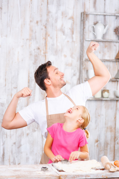 Happy father and daughter baking together - Фото, зображення