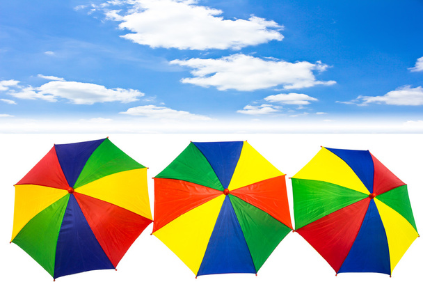 umbrella on blue sky with cloud - 写真・画像