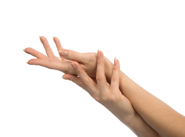 piękna kobieta ręce z Francuski manicure paznokcie na białym tle - Zdjęcie, obraz