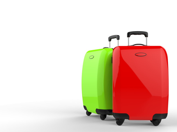 緑と赤のスーツケース - 写真・画像