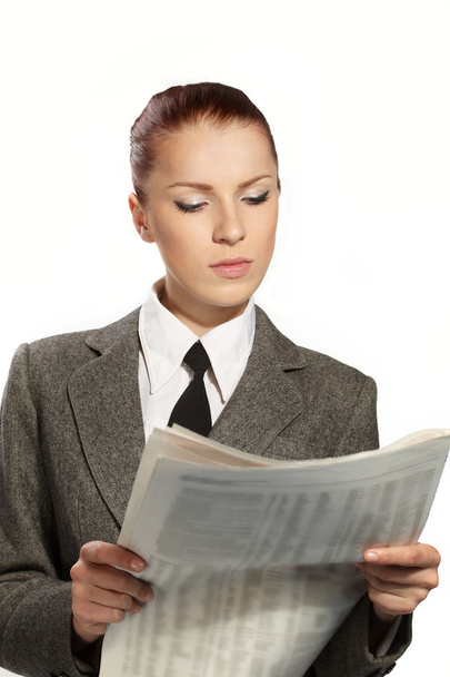 mujer de negocios con periódico
 - Foto, imagen