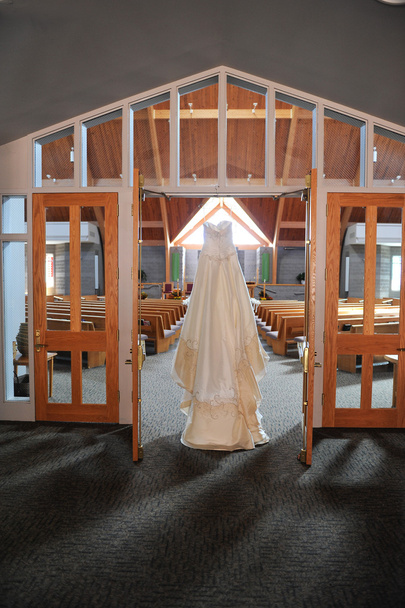 Wedding Dress Hanging Up in a Church - Photo, Image