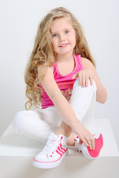 Portrait of a young girl in sportswear - Foto, Imagen