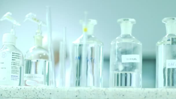 Glass in chemistry lab - Filmati, video