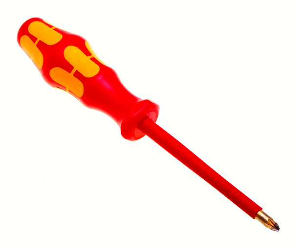 Red screwdriver for electrical work, isolated on a white backgro - Foto, Imagen