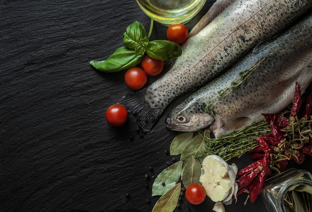Fresh fish with spices, basil - Zdjęcie, obraz