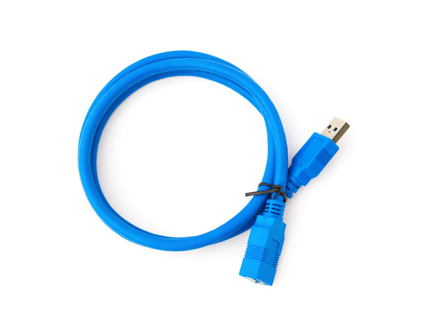 vista superior cable usb azul sobre un fondo blanco
 - Foto, imagen