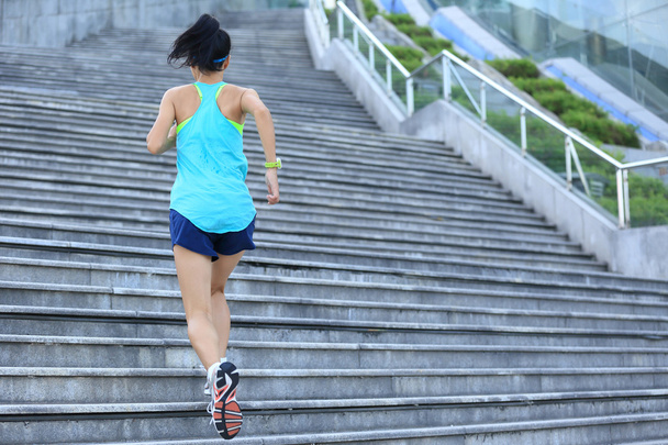 young fitness woman on on stairs - Photo, Image
